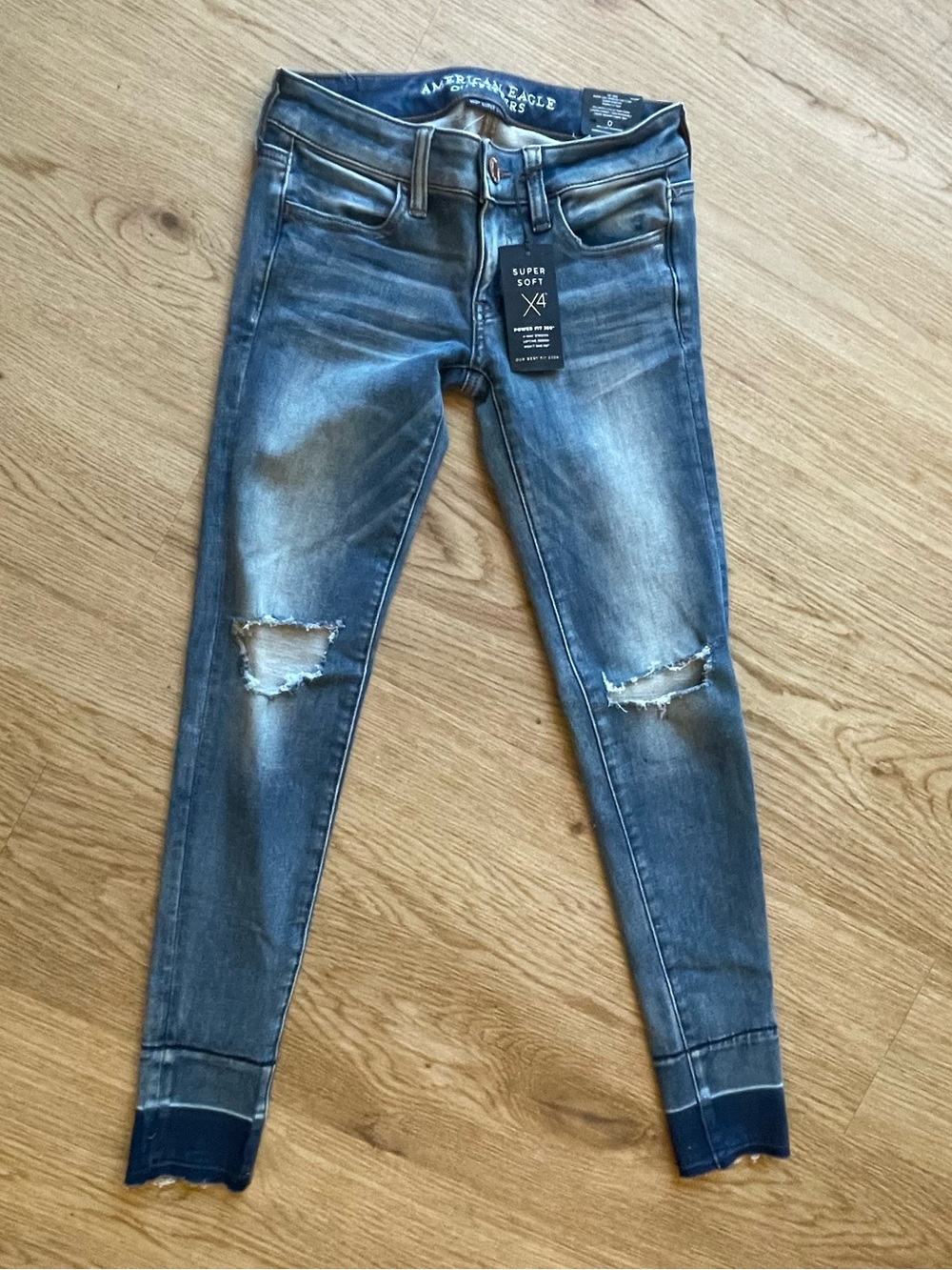American Eagle Outfitters Ripped Dark-Mid Blue Skinny Jeans